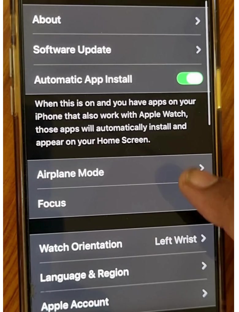The General screen in the Apple Watch app showing About, Software Update and Automatic App Install