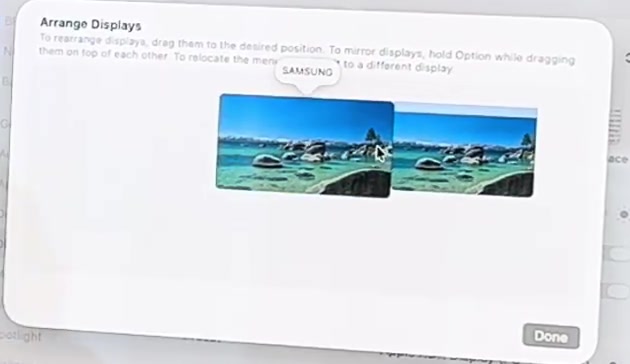 Arrange Displays sheet with the Samsung monitor positioned beside the built-in display