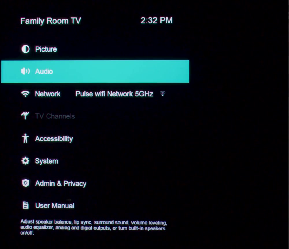 Vizio TV settings menu showing Picture, Audio, Network, Accessibility, System and Admin and Privacy rows, with the Network row displaying the current WiFi network name