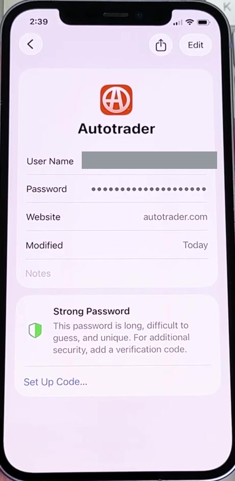A saved account detail screen in the Passwords app showing User Name, Password, Website and Modified fields