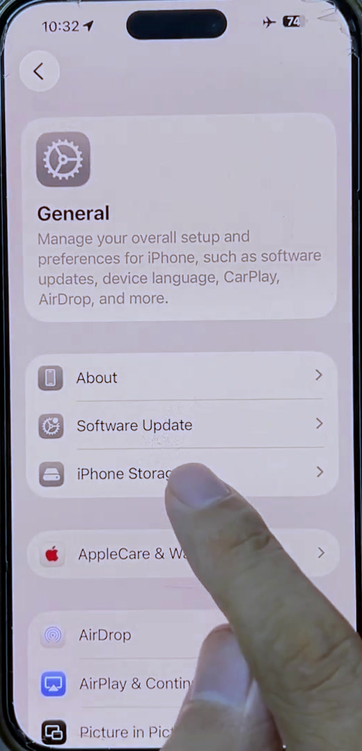 Settings General menu on an iPhone with the iPhone Storage row visible below About and Software Update