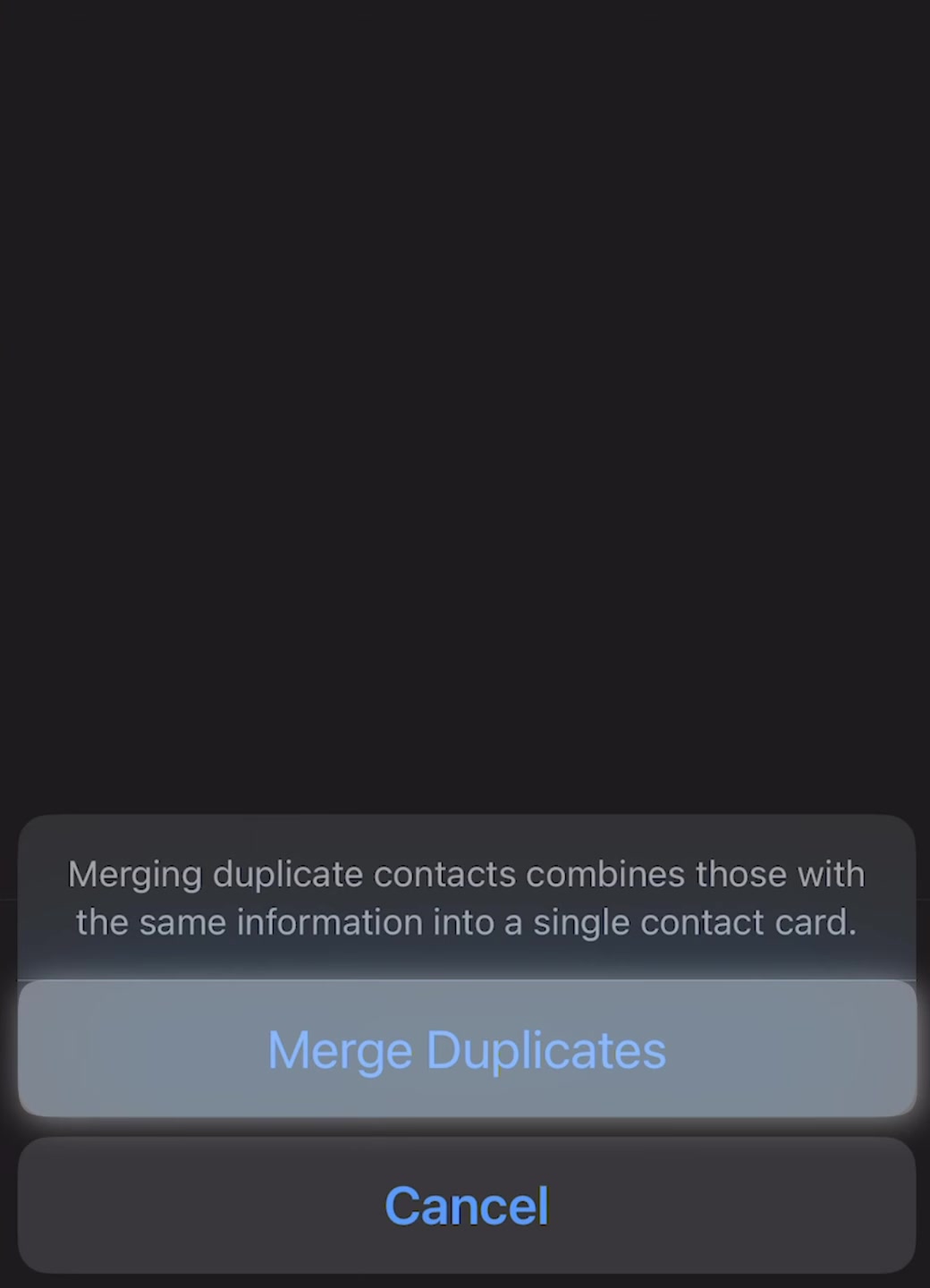 Confirmation sheet reading Merging duplicate contacts combines those with the same information into a single contact card