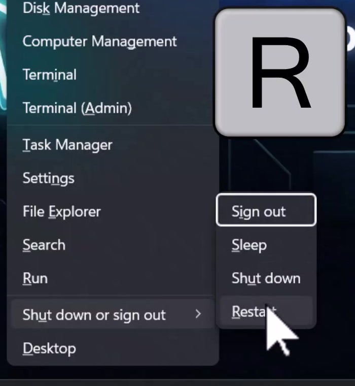 The Shut down or sign out submenu expanded with Restart highlighted, and an on-screen overlay of the R key