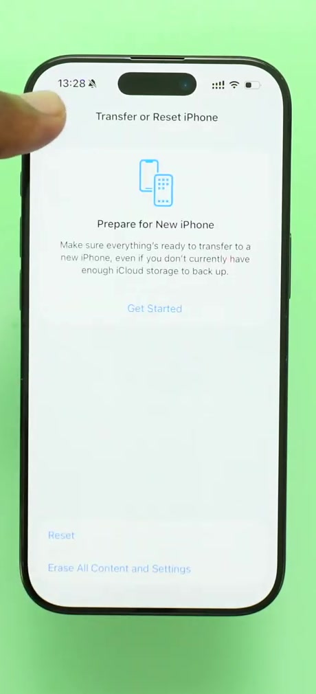 The Transfer or Reset iPhone screen showing Erase All Content and Settings