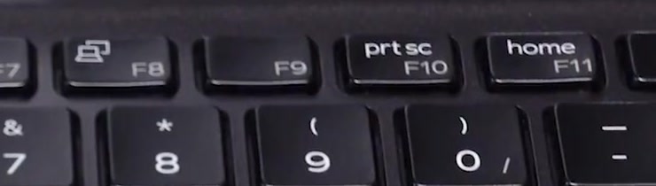 Close-up of a Dell laptop keyboard showing the prt sc key sharing the F10 position in the top function row
