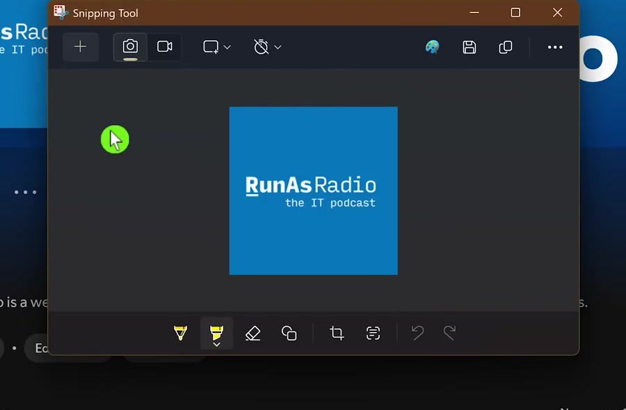 A captured screenshot open in the Snipping Tool with the annotation toolbar showing pen, highlighter, eraser and crop buttons