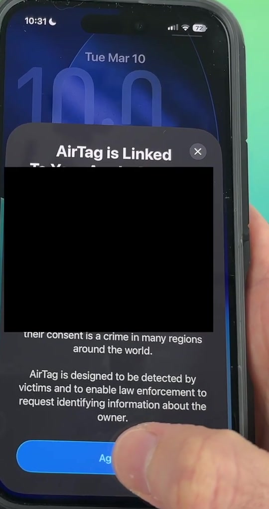 iPhone showing the AirTag is Linked screen with text about tracking people without consent and an Agree button