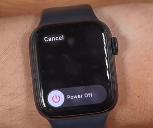 The Power Off slider displayed at the bottom of the Apple Watch screen with Cancel above it