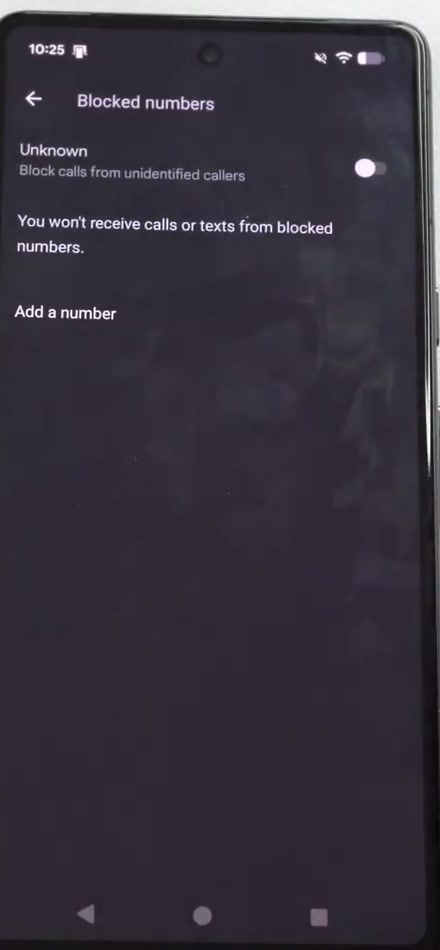 The Blocked numbers screen in the Google Phone app, showing the Unknown toggle and the Add a number option