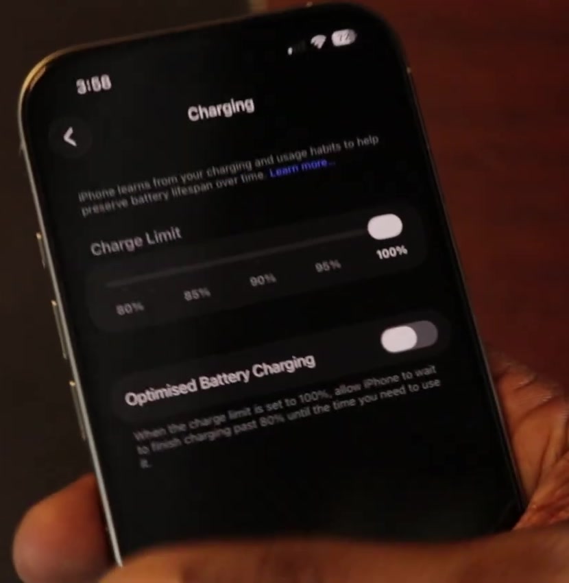 The Charging screen in iPhone Settings showing the Charge Limit slider and Optimised Battery Charging